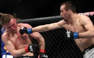 Аскар Аскаров победил Тима Эллиотта на UFC 246