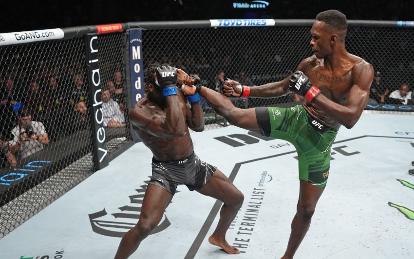 Исраэль Адесанья без блеска победил Джареда Каннонье на UFC 276